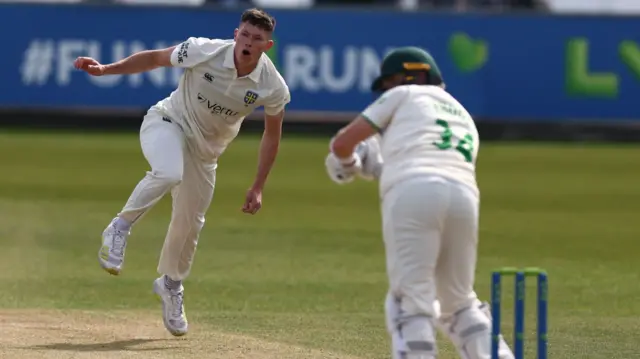 Matty Potts bowling for Durham