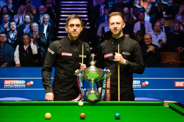 Ronnie O'Sullivan and Judd Trump.