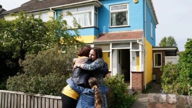 Rend Platings's house in Cambridge is painted in the colours of the Ukraine flag