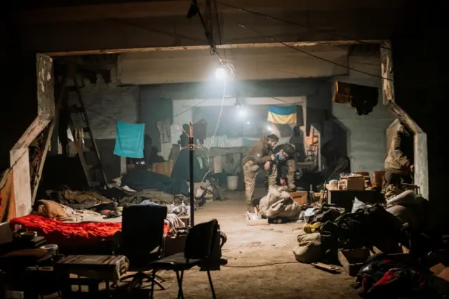 Ukrainian troops pictured inside the Azovstal steelworks plant before the evacuation