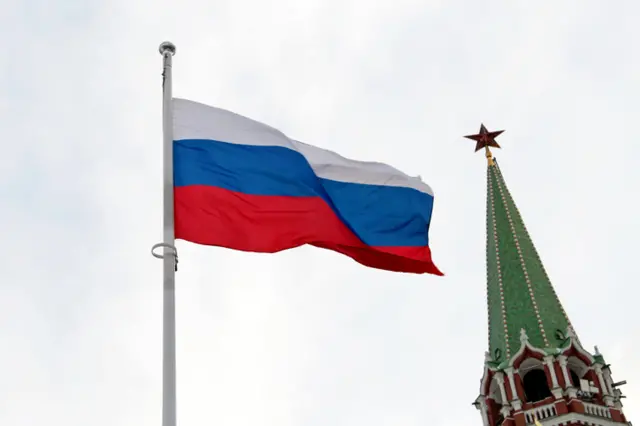 A Russian flag flying over the Kremlin