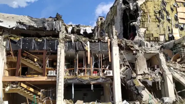 A building left in ruins following the missile strike on the cultural centre in Lozova