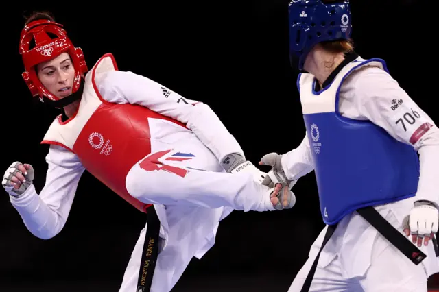 Bianca Walkden competes against Aleksandra Kowalczuk