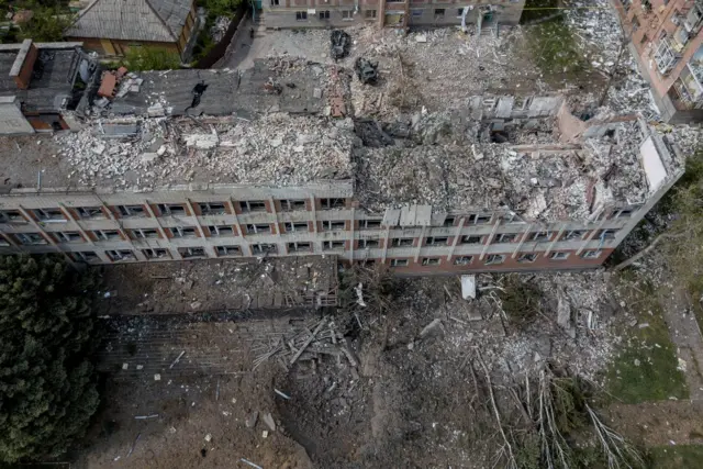 Aerial view of a damaged building