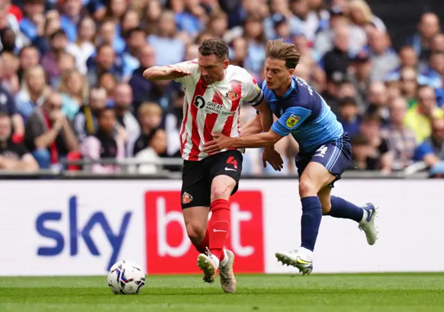 Corry Evans in action for Sunderland v Wycombe