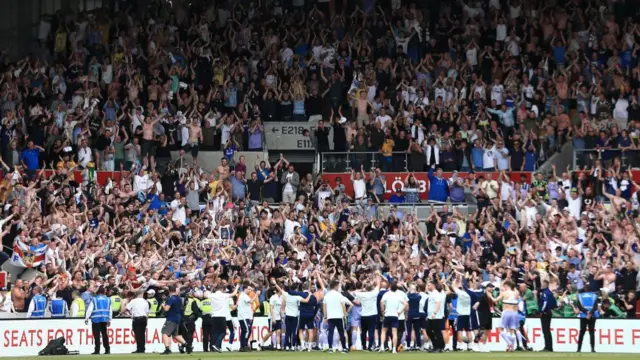 Leeds players and fans celebrate