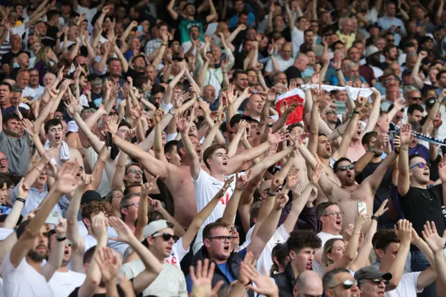 Tottenham fans celebrate at Norwich