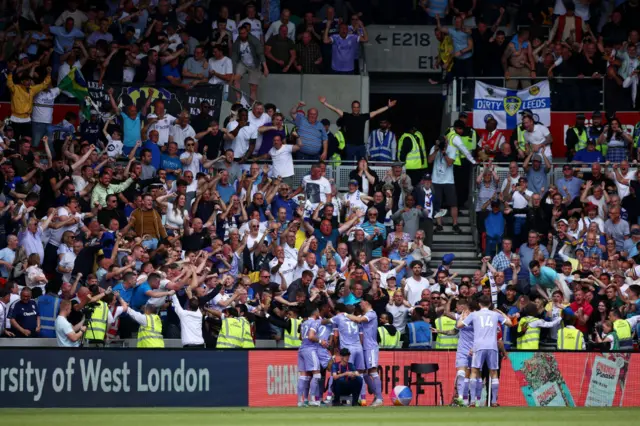 Leeds fans celebrate Jack Harrison's goal