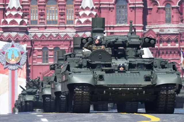 A line of Russian Terminators drive through Red Square