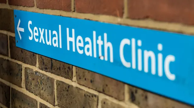 A sign for a sexual health clinic