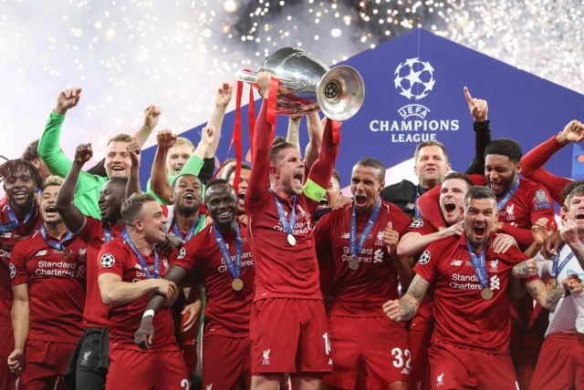 .Liverpool's players celebrate winning the 2019 Champions League final