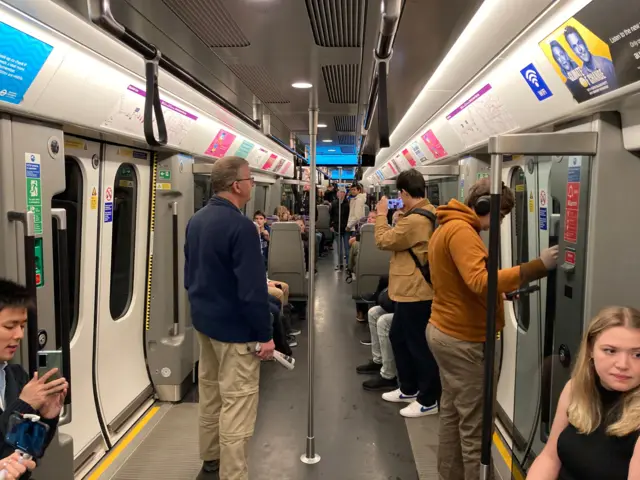 People on Crossrail train