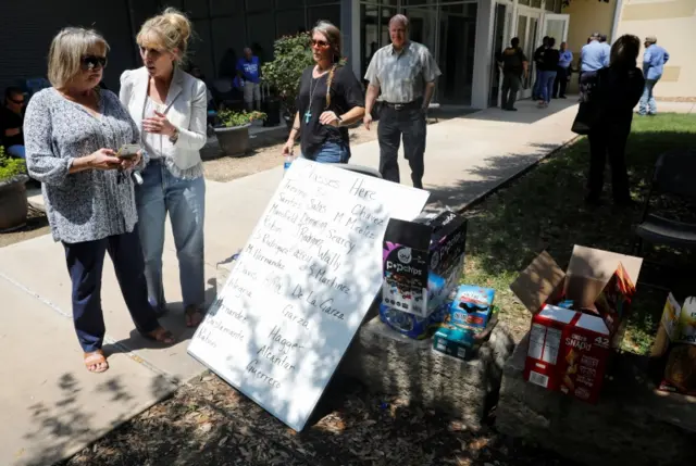 board with the list of classes/teachers is displayed outside the Ssgt Willie de Leon Civic Center, where students had been transported from Robb Elementary School to be picked up after a suspected shooting, in Uvalde, Texas,