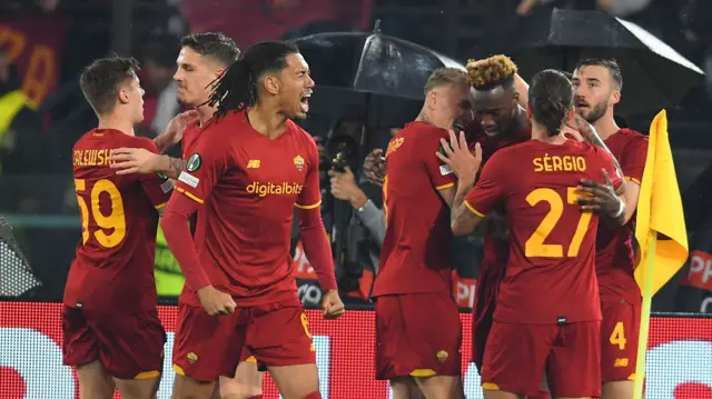 Roma players celebrate