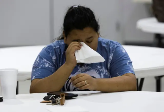 Erika Escamilla weeps during a prayer vigil at Getty Street Church of Christ after a mass shooting at Robb Elementary School in Uvalde, Texas, U.S., May 24, 202