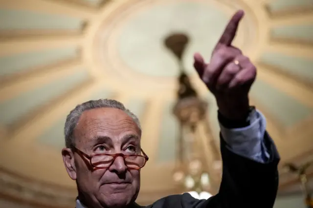 Senate Majority Leader Chuck Schumer speaks to reporters on Tuesday