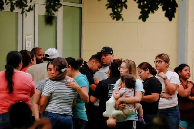 People wait at civic centre