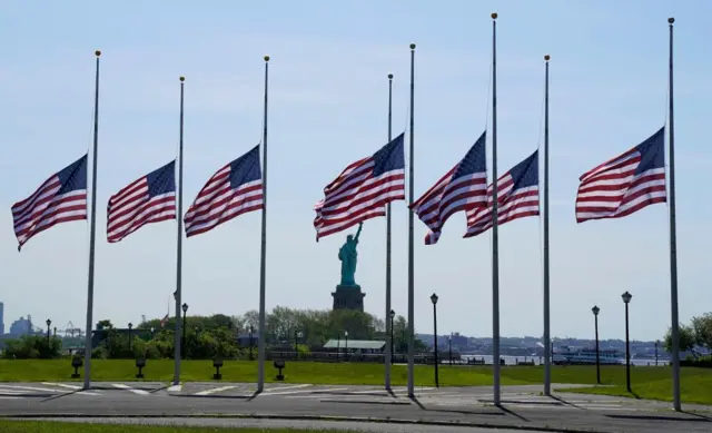 US flags were lowered to half-mast at Liberty State Park in New Jersey