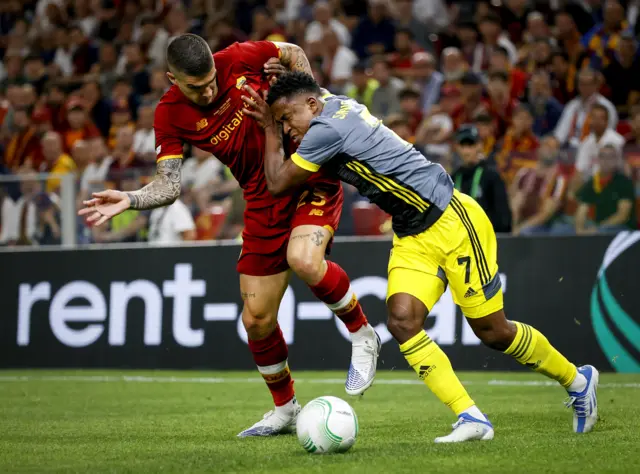 Gianluca Mancini of AS Roma and Luis Sinisterra of Feyenoord