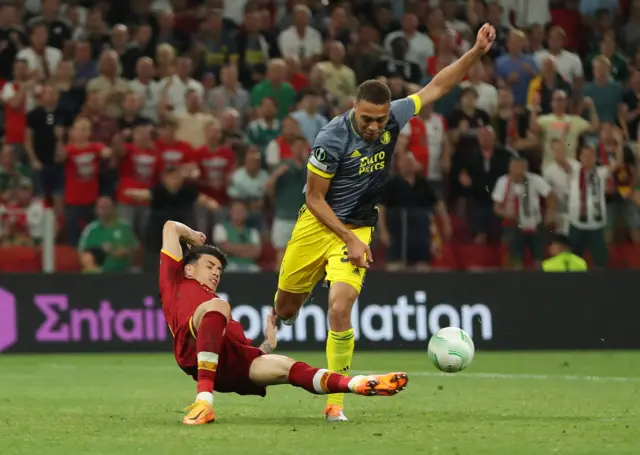 AS Roma's Roger Ibanez in action with Feyenoord's Cyriel Dessers