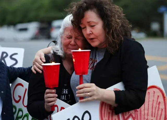 Protesters held a vigil in front of the headquarters of the National Rifle Association (NRA) gun lobby