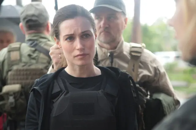 Close of Finnish Prime Minister Sanna Marin with bullet-proof vest