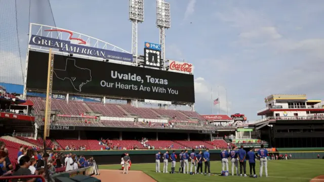 A sign sends of message of grieving to Uvalde at an MLB game in Ohio