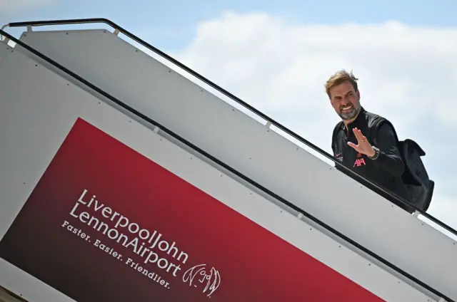 Jurgen Klopp boarding the flight