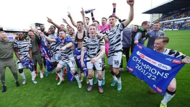 Forest Green Rovers celebrate winning the League Two title on the final day of the season