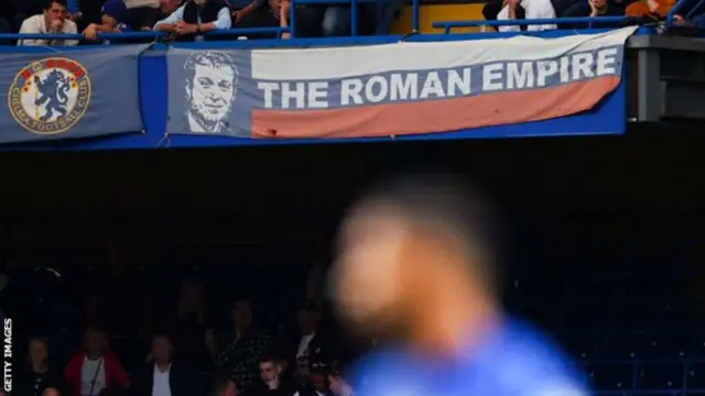 A Roman Abramovich banner at Stamford Bridge