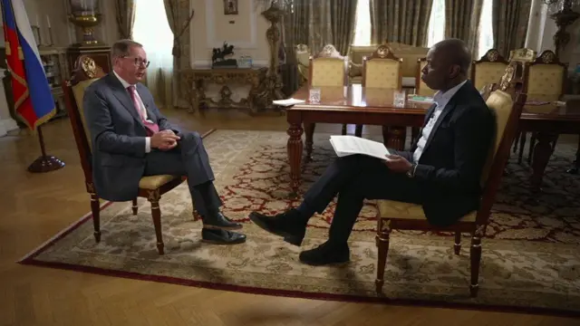 The BBC's Clive Myrie with Russian ambassador to the UK Andrei Kelin