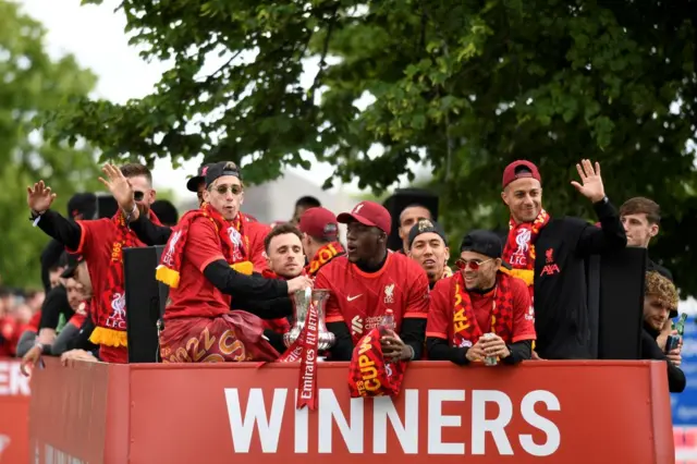 Liverpool players on a bus