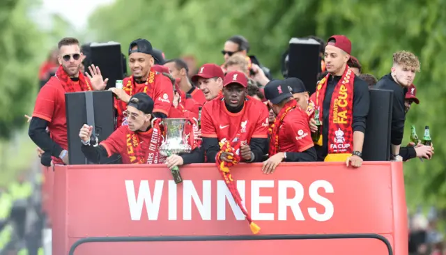 Liverpool players on a bus