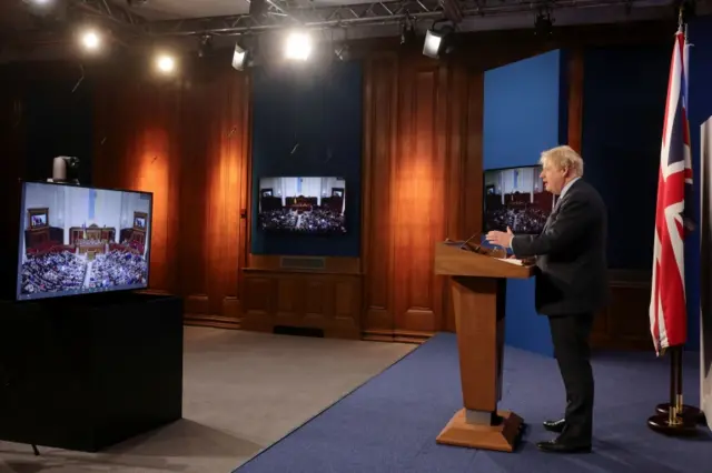 Boris Johnson speaks remotely to the Ukrainian parliament