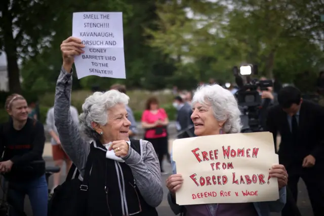 Roberta Shapiro (L) and Kim Fellner (R) demonstrate in front of the US Supreme Court Building on May 03, 2022 in Washington, DC