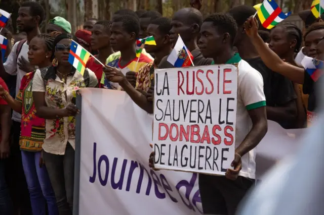 A man holds a pro-Russian placard in Bangui