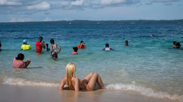 Tourists Sunbathing White Sands Beach Changuu island