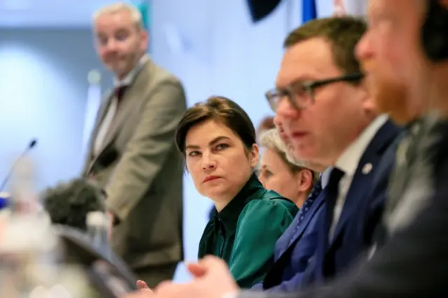 Ukraine's top prosecutor Iryna Venediktova listens as she attends a news conference