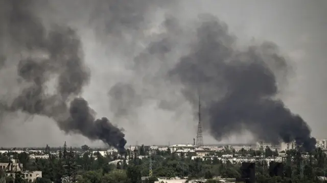 Smoke rises in the city of Severodonetsk