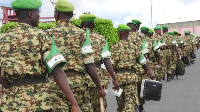 Burundian soldiers wait in line before departing from Bujumbura to Somalia in 2017