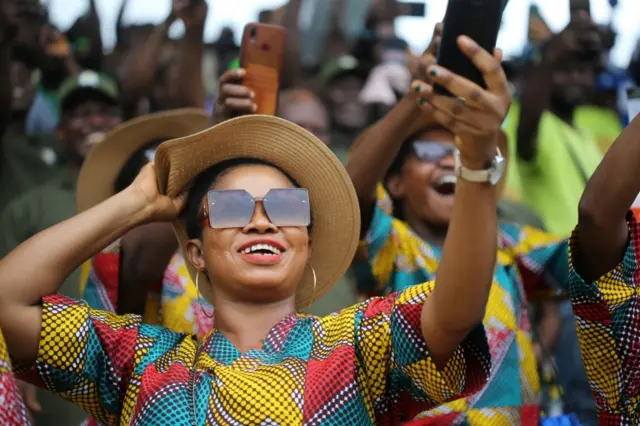 Women taking selfies in Lagos, Nigeria - 1 May 2022