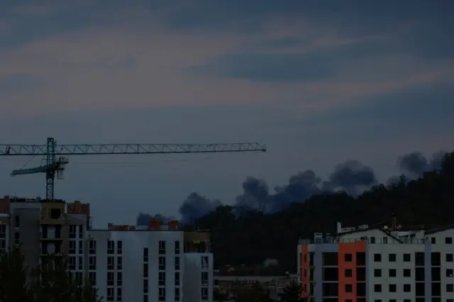 Smoke is seen billowing over Lviv