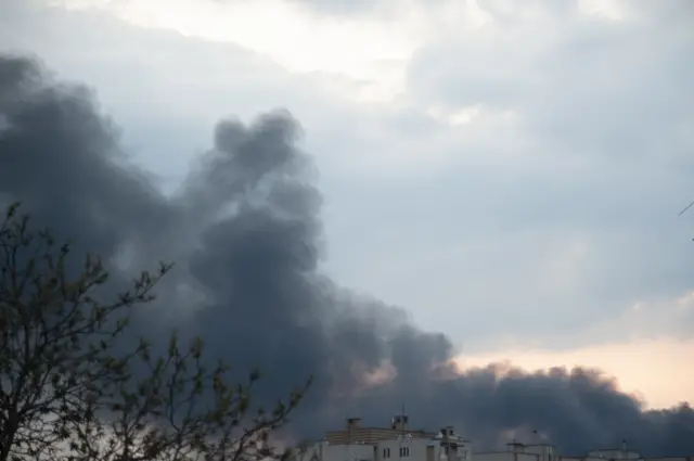 Dark smoke is billowing over the city of Lviv following an airstrike