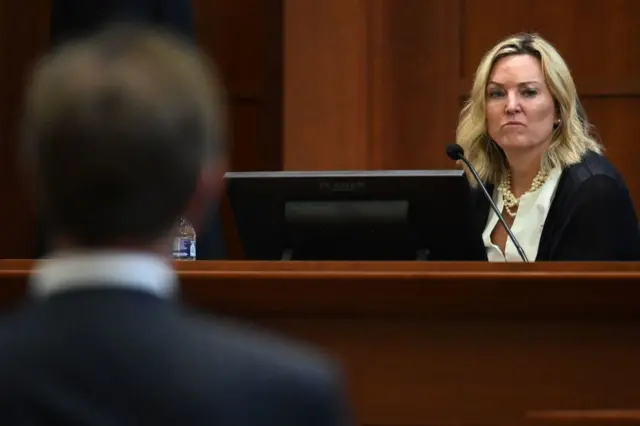 Forensic psychologist Dr. Dawn Hughes, testifies during a hearing at the Fairfax County Circuit Courthouse in Fairfax, Virginia, on May 3, 2022