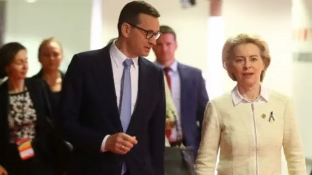 Polish Prime Minister Mateusz Morawiecki (C-L) and European Commission President Ursula von der Leyen (C-R) arrive at the High-Level International Donors" Conference for Ukraine,