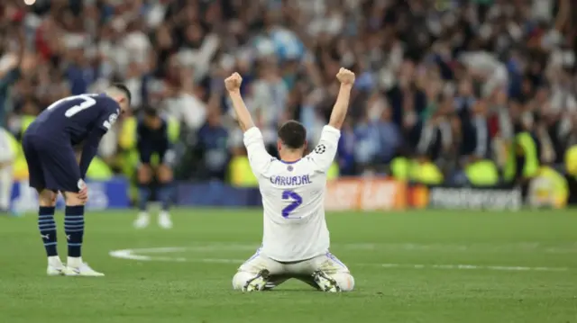 Dani Carvajal celebrates next to Phil Foden