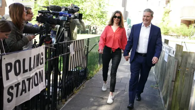 Labour Party leader Sir Keir Starmer with his wife Victoria Starmer at a polling station