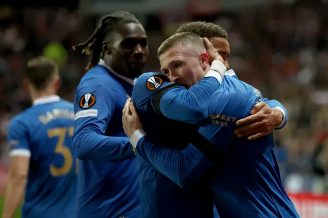 John Lundstram celebrates after making it 3-1 to Rangers