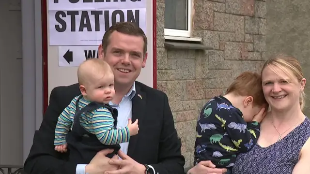 Scottish Conservative Leader Douglas Ross with his wife and children