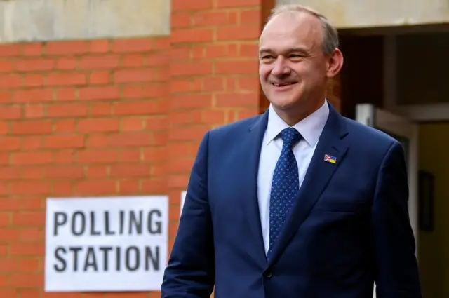 Sir Ed Davey outside a polling station in Kingston upon Thames